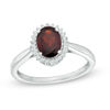 Thumbnail Image 0 of Oval Garnet and Lab-Created White Sapphire Frame Ring in 10K White Gold