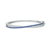 Thumbnail Image 0 of Lab-Created Blue and White Sapphire Crossover Ribbon Bangle in Sterling Silver