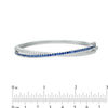 Thumbnail Image 1 of Lab-Created Blue and White Sapphire Crossover Ribbon Bangle in Sterling Silver