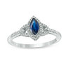 Thumbnail Image 0 of Marquise Lab-Created Blue Sapphire and 1/6 CT. T.W. Diamond Frame Buckle Ring in 10K White Gold