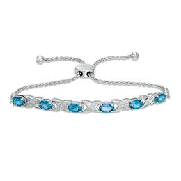Blue Topaz December Birthstone Birthstones Collections Zales Oval Swiss Blue Topaz And Diamond Accent Xo Bolo Bracelet In Sterling Silver
