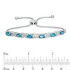Thumbnail Image 2 of Oval Swiss Blue Topaz and Diamond Accent "XO" Bolo Bracelet in Sterling Silver - 9.5"