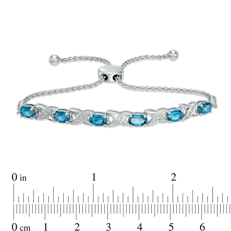 Main Image 2 of Oval Swiss Blue Topaz and Diamond Accent "XO" Bolo Bracelet in Sterling Silver - 9.5"