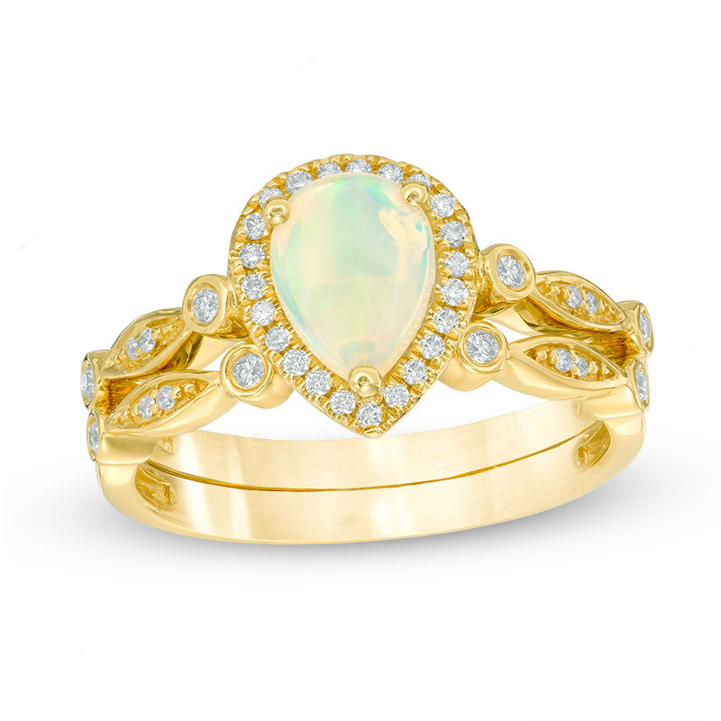 Pear-Shaped Opal and 1/8 CT. T.W. Diamond Frame Vintage-Style Bridal Set in 14K Gold
