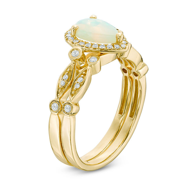 Pear-Shaped Opal and 1/8 CT. T.W. Diamond Frame Vintage-Style Bridal Set in 14K Gold