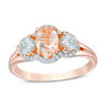Thumbnail Image 1 of Oval Morganite, Aquamarine and 1/8 CT. T.W. Diamond Frame Three Stone Ring in 10K Rose Gold