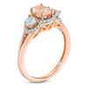Thumbnail Image 2 of Oval Morganite, Aquamarine and 1/8 CT. T.W. Diamond Frame Three Stone Ring in 10K Rose Gold
