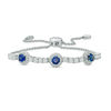 Thumbnail Image 1 of 5.0mm Lab-Created Blue and White Sapphire Frame Three Stone Bolo Bracelet in Sterling Silver - 9.0"