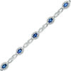 Thumbnail Image 0 of Oval Lab-Created Ceylon Sapphire and Diamond Accent Starburst Frame Link Bracelet in Sterling Silver - 7.5"