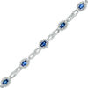 Thumbnail Image 1 of Oval Lab-Created Ceylon Sapphire and Diamond Accent Starburst Frame Link Bracelet in Sterling Silver - 7.5"