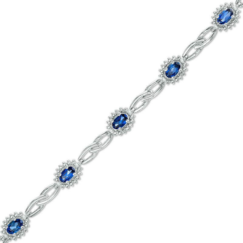 Oval Lab-Created Ceylon Sapphire and Diamond Accent Starburst Frame Link Bracelet in Sterling Silver - 7.5"
