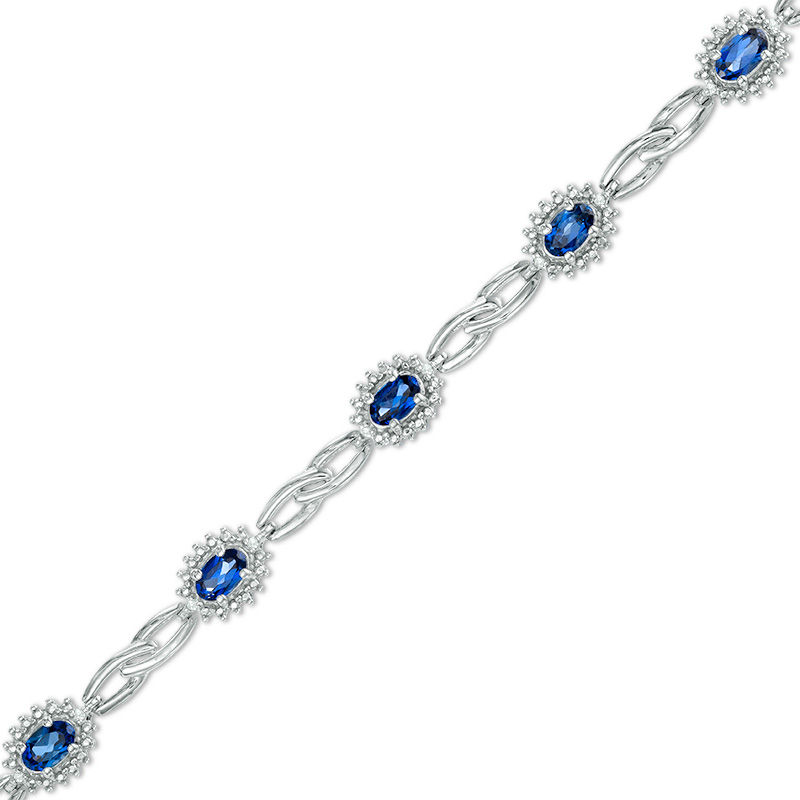 Main Image 1 of Oval Lab-Created Ceylon Sapphire and Diamond Accent Starburst Frame Link Bracelet in Sterling Silver - 7.5"