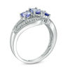 Thumbnail Image 1 of Oval Tanzanite and Diamond Accent Three Stone Bypass Ring in Sterling Silver