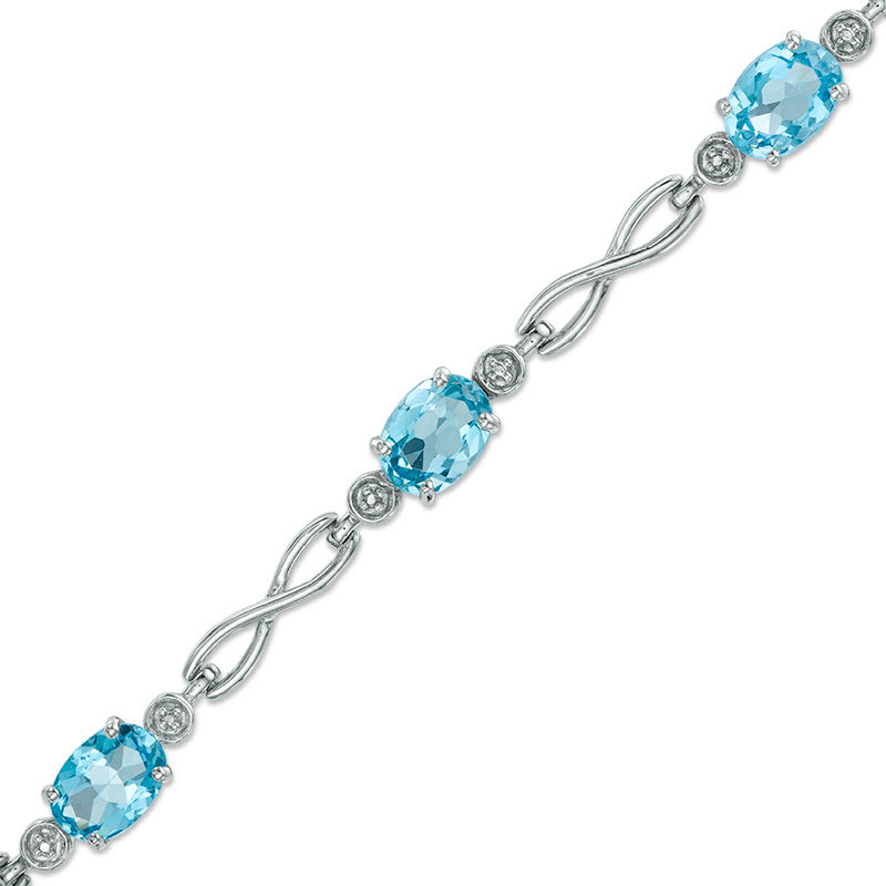 Oval Swiss Blue Topaz Infinity Link Bracelet in Sterling Silver - 7.25"