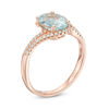 Thumbnail Image 1 of Oval Aquamarine and 1/8 CT. T.W. Diamond Bypass Split Shank Ring in 10K Rose Gold