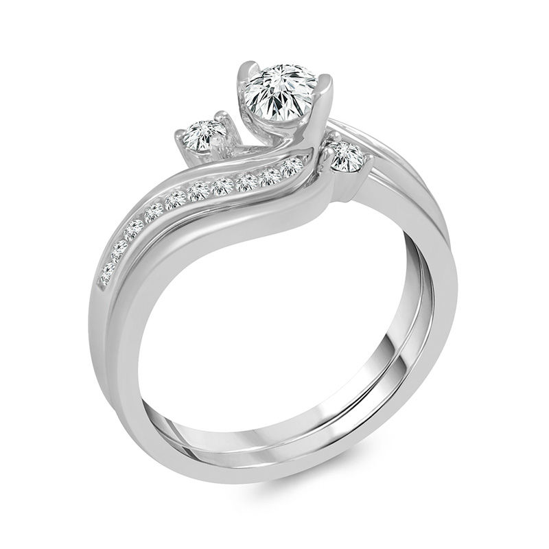 5/8 CT. T.W. Diamond Bypass Bridal Set in 14K White Gold