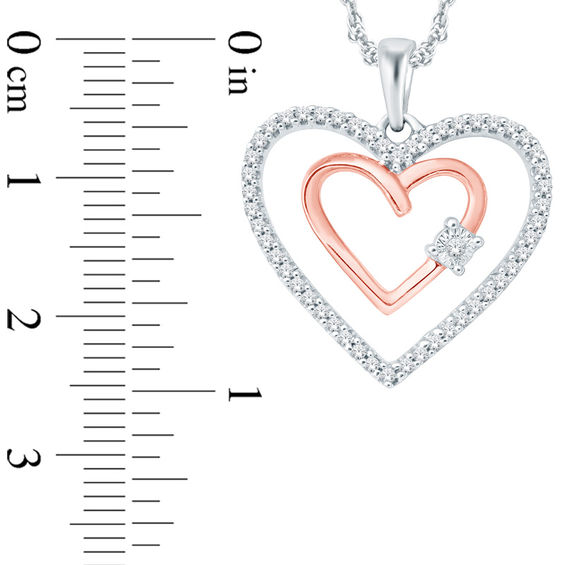 1/6 CT. T.w. Diamond Double Heart Pendant in 10K Rose Gold