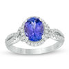 Thumbnail Image 1 of Oval Tanzanite and 3/8 CT. T.W. Diamond Frame Twist Shank Ring in 14K White Gold