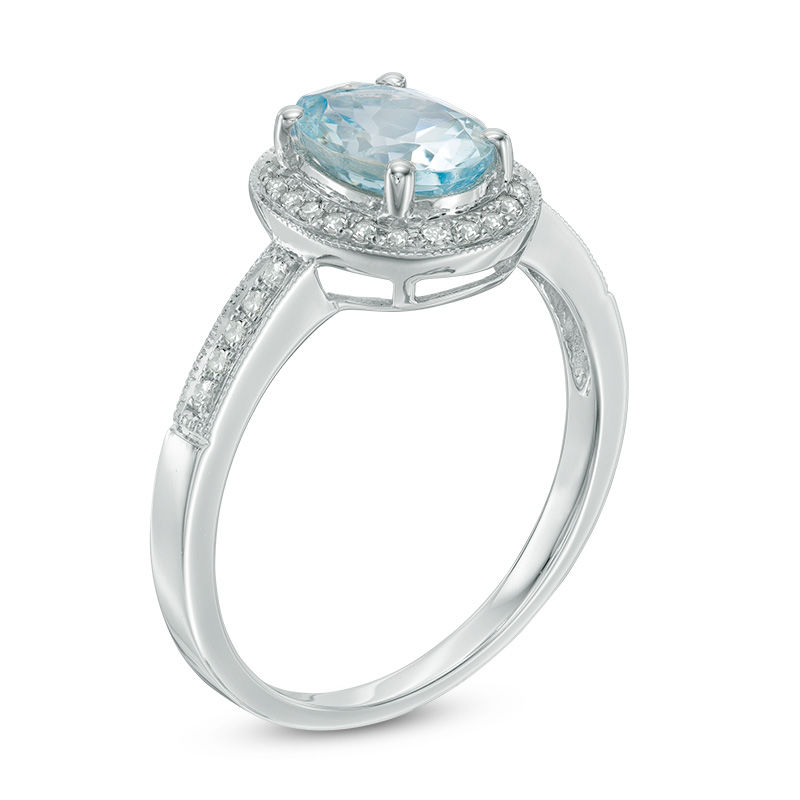 Oval Aquamarine and 1/10 CT. T.W. Diamond Frame Vintage-Style Ring in Sterling Silver