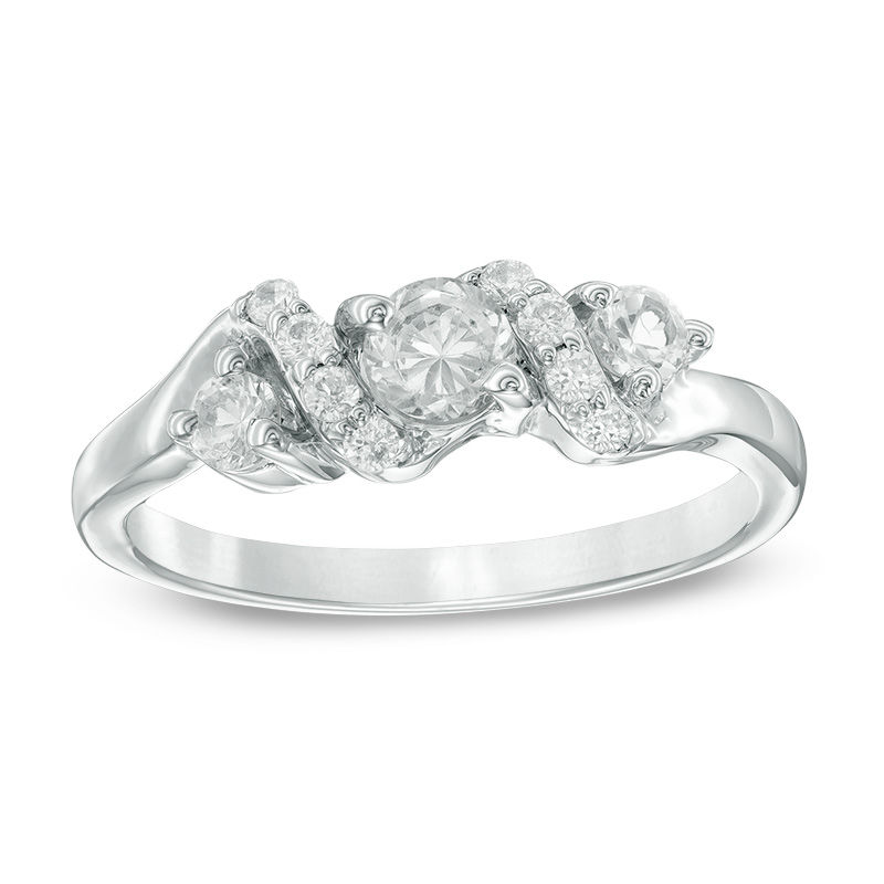 Main Image 1 of 4.0mm Lab-Created White Sapphire and 1/10 CT. T.W. Diamond Overlay Three Stone Ring in Sterling Silver