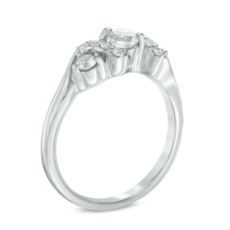 4.0mm Lab-Created White Sapphire and 1/10 CT. T.W. Diamond Overlay Three Stone Ring in Sterling Silver