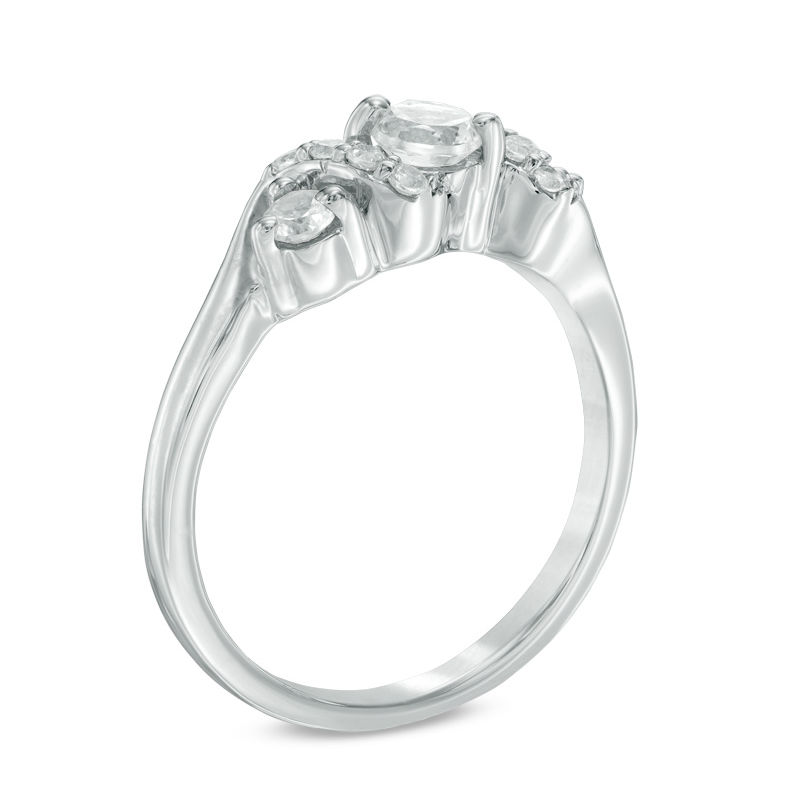 Main Image 2 of 4.0mm Lab-Created White Sapphire and 1/10 CT. T.W. Diamond Overlay Three Stone Ring in Sterling Silver