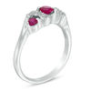 Thumbnail Image 1 of 4.0mm Lab-Created Ruby and 1/10 CT. T.W. Diamond Overlay Three Stone Ring in Sterling Silver