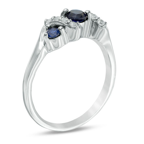 4.0mm Lab-Created Blue Sapphire and 1/10 CT. T.w. Diamond Overlay Three Stone Ring in Sterling Silver