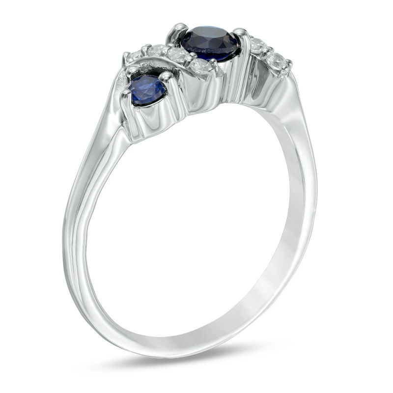 Main Image 2 of 4.0mm Lab-Created Blue Sapphire and 1/10 CT. T.W. Diamond Overlay Three Stone Ring in Sterling Silver