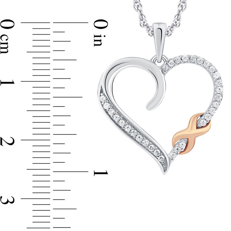 Main Image 2 of 1/10 CT. T.W. Diamond Heart with Infinity Pendant in 10K Two-Tone Gold