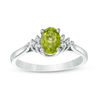 Thumbnail Image 0 of Oval Peridot and Diamond Accent Tri-Sides Ring in 10K White Gold