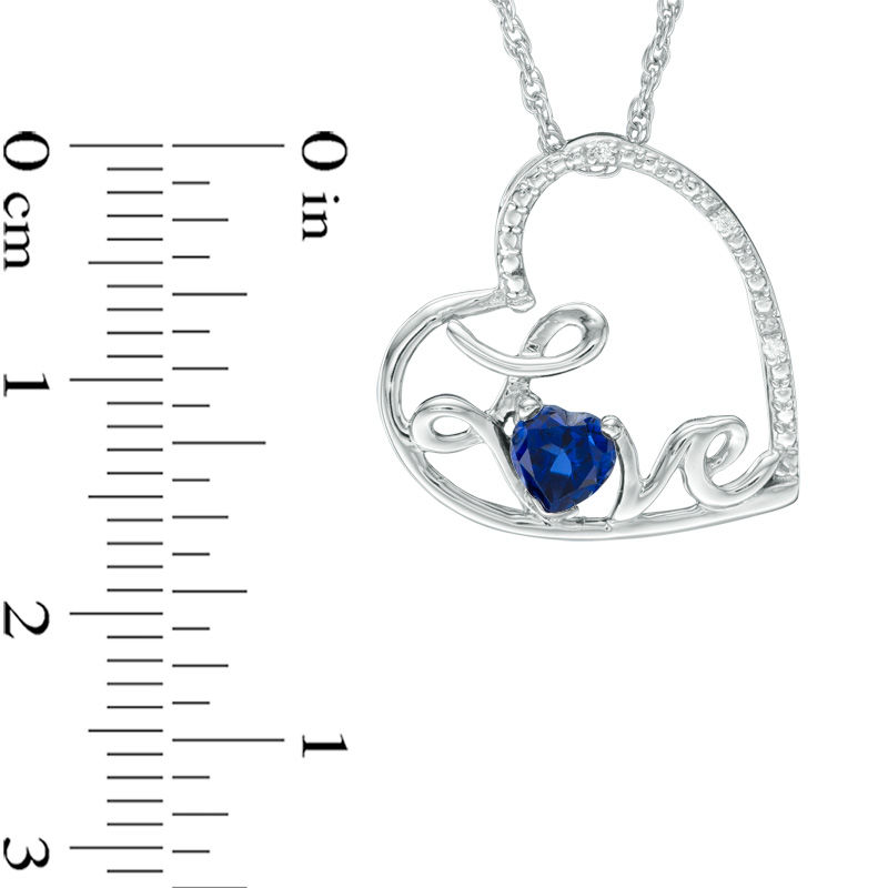 Main Image 2 of 4.0mm Lab-Created Blue Sapphire and Diamond Accent Cursive "Love" Tilted Heart Pendant in Sterling Silver