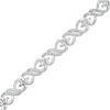 Thumbnail Image 1 of 1/10 CT. T.W. Diamond Heart-Shaped Infinity Link Bracelet in Sterling Silver - 7.5"