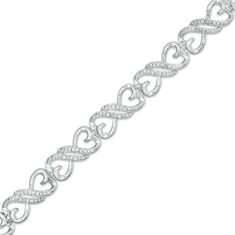Main Image 1 of 1/10 CT. T.W. Diamond Heart-Shaped Infinity Link Bracelet in Sterling Silver - 7.5"