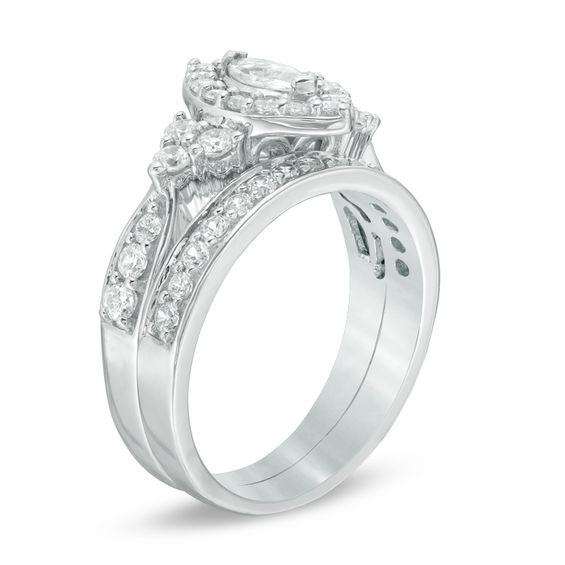 1-1/5 CT. T.w. Marquise Diamond Frame Tri-Sides Bridal Set in 10K White Gold
