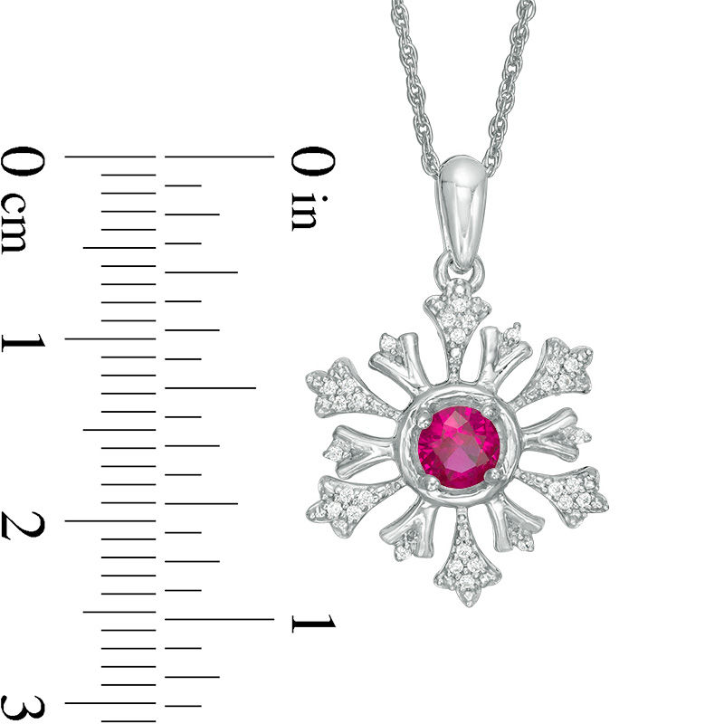 4.5mm Lab-Created Ruby and 1/10 CT. T.W. Diamond Snowflake Pendant in Sterling Silver