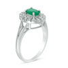 Thumbnail Image 1 of Oval Emerald and 1/10 CT. T.W. Diamond Frame Split Shank Ring in 10K White Gold