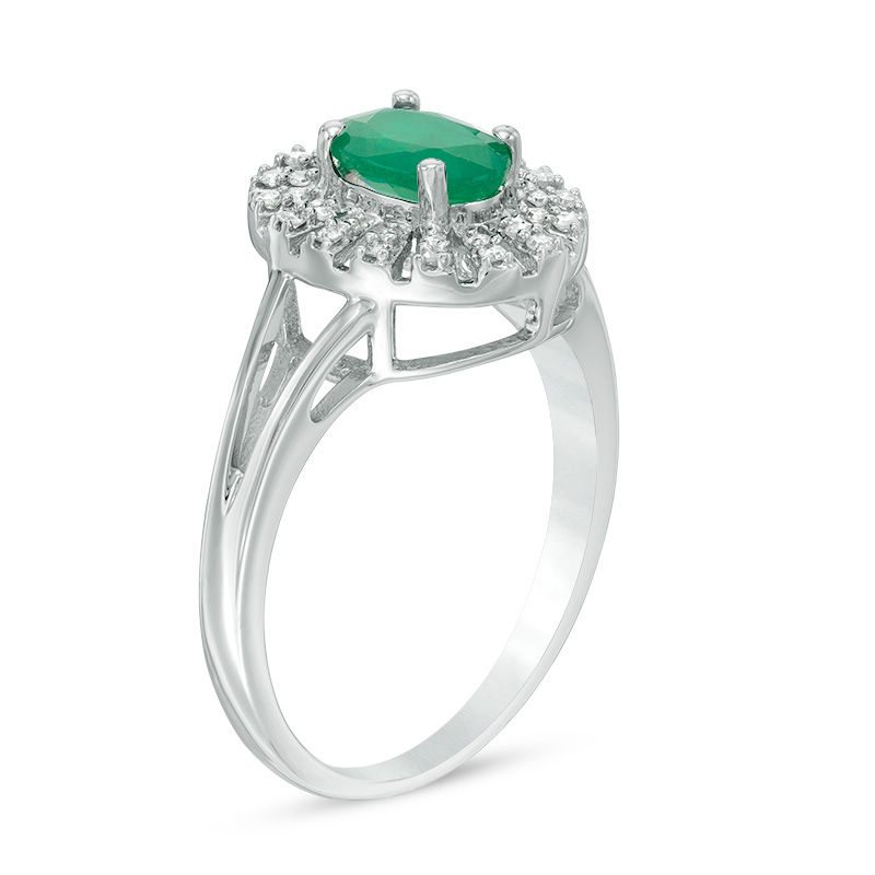Oval Emerald and 1/10 CT. T.W. Diamond Frame Split Shank Ring in 10K White Gold