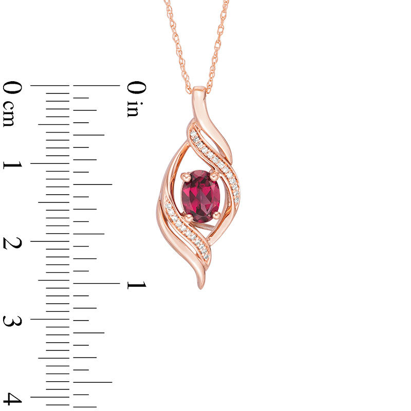 Oval Rhodolite Garnet and 1/20 CT. T.W. Diamond Open Flame Pendant in 10K Rose Gold