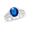 Thumbnail Image 0 of Oval Blue Sapphire and 3/4 CT. T.W. Diamond Triple Row Ring in 18K White Gold
