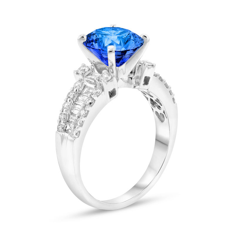 Oval Blue Sapphire and 3/4 CT. T.W. Diamond Triple Row Ring in 18K White Gold