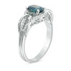 Thumbnail Image 1 of Oval Blue Sapphire and 1/6 CT. T.W. Diamond Loop Overlay Ring in 10K White Gold