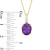 Thumbnail Image 1 of Oval Amethyst and 1/10 CT. T.W. Diamond Drop Pendant in 10K Gold