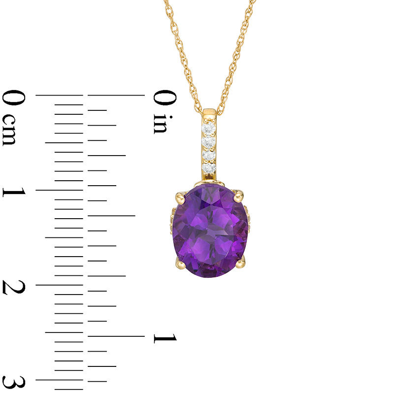 Oval Amethyst and 1/10 CT. T.W. Diamond Drop Pendant in 10K Gold