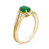 Thumbnail Image 1 of Oval Emerald and 1/8 CT. T.W. Diamond Tri-Sides Bypass Ring in 10K Gold