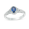 Thumbnail Image 0 of Oval Blue Sapphire and 1/5 CT. T.W. Diamond Frame Ring in 10K White Gold