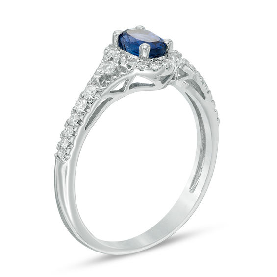 Oval Blue Sapphire and 1/5 CT. T.w. Diamond Frame Ring in 10K White Gold