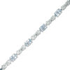 Thumbnail Image 1 of Oval Aquamarine and Diamond Accent Infinity Link Bracelet in Sterling Silver - 7.25"