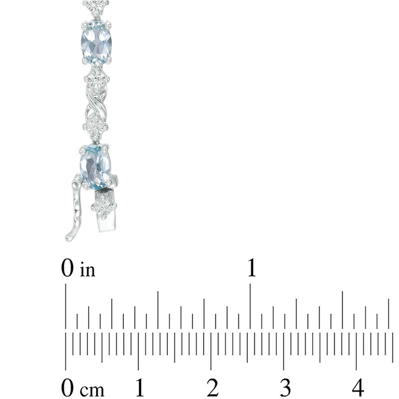 Main Image 2 of Oval Aquamarine and Diamond Accent Infinity Link Bracelet in Sterling Silver - 7.25"