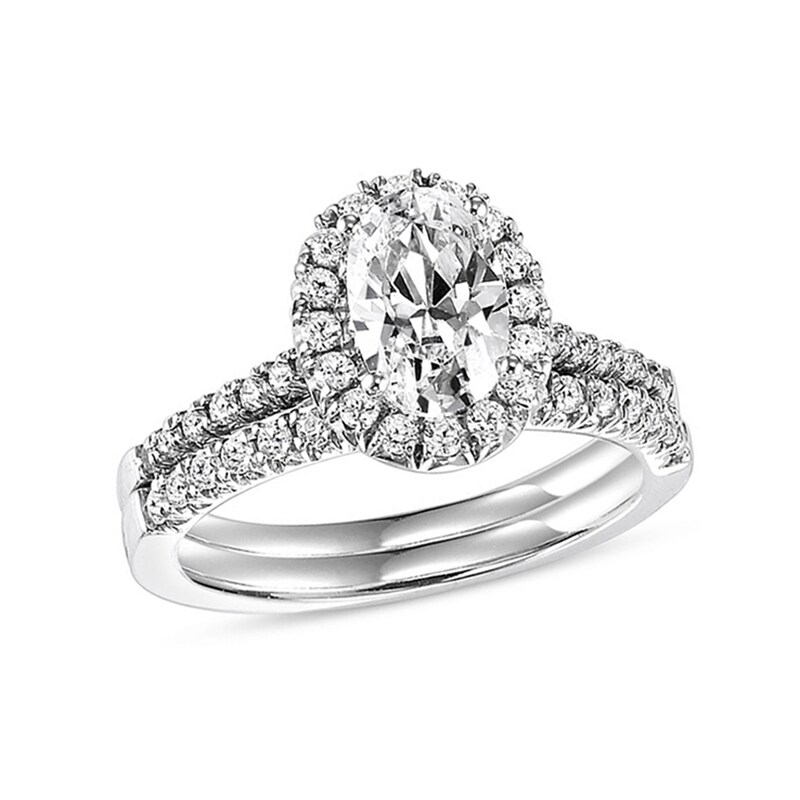 Main Image 1 of 3/4 CT. T.W. Oval Diamond Frame Bridal Set in 14K White Gold
